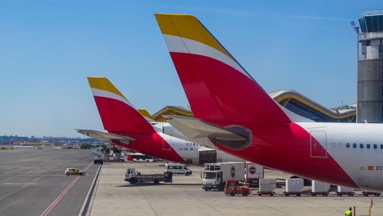 two Austrian Airlines at the airport during daytime