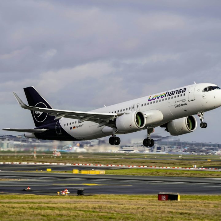 a large jetliner taking off from an airport runway