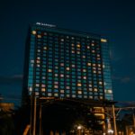 a very tall building lit up at night