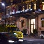 Ambulance parked outside the ritz-carlton hotel at night